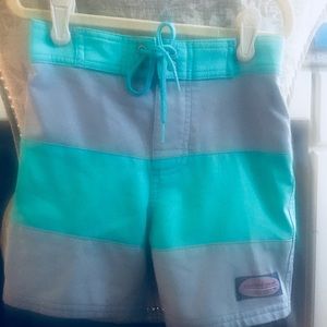 Vineyard Vines boys swim trunks.